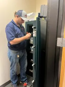 locksmith working on a gun safe