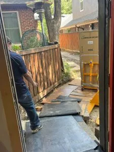 dallas safe and vault team delivering a large safe through a customer's front door